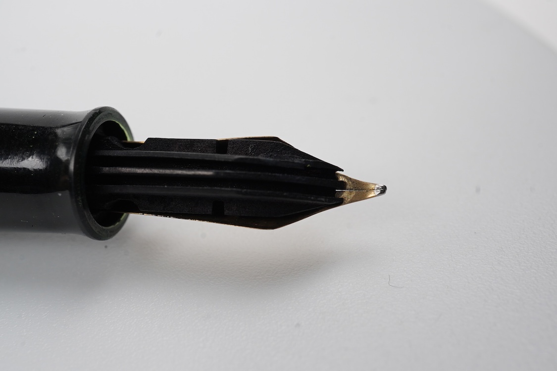 A Pelikan 100N fountain pen fitted with a 14ct. gold Pelikan nib
